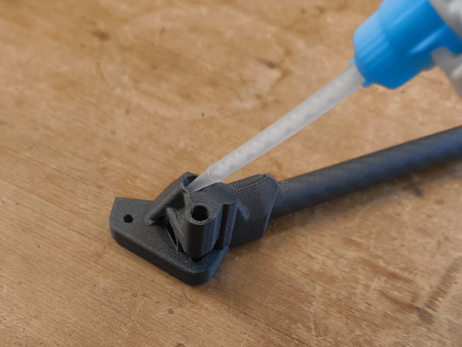 Epoxy being injected through the internal port